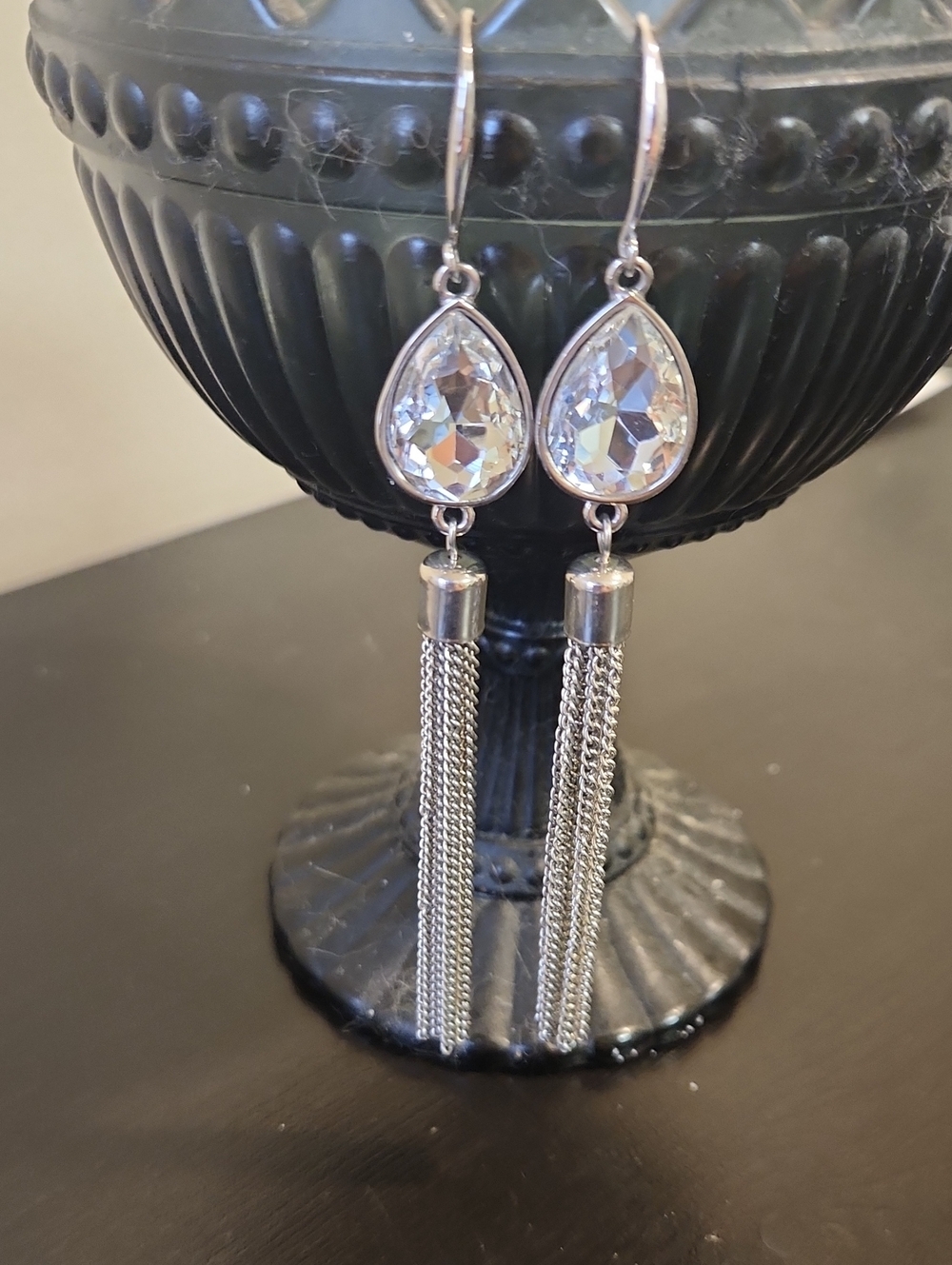 Silver Hanging Earrings With A Sparkling Stone